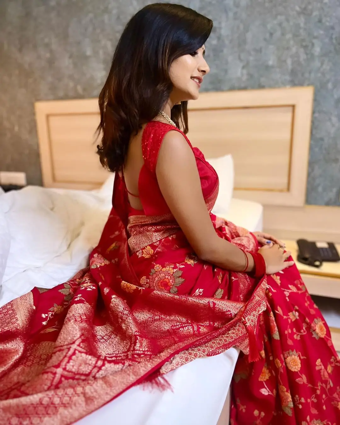 Vasanthi Krishnan Wearing Red Saree Sleeveless Blouse